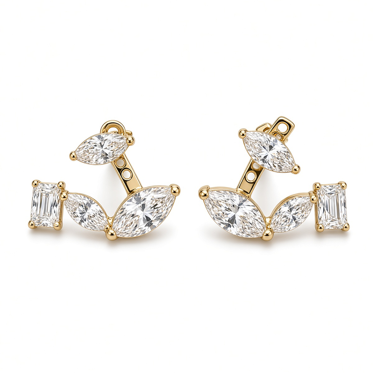 A pair of gold stud earrings featuring marquise and baguette-cut clear gemstones, displayed on a clean white background.