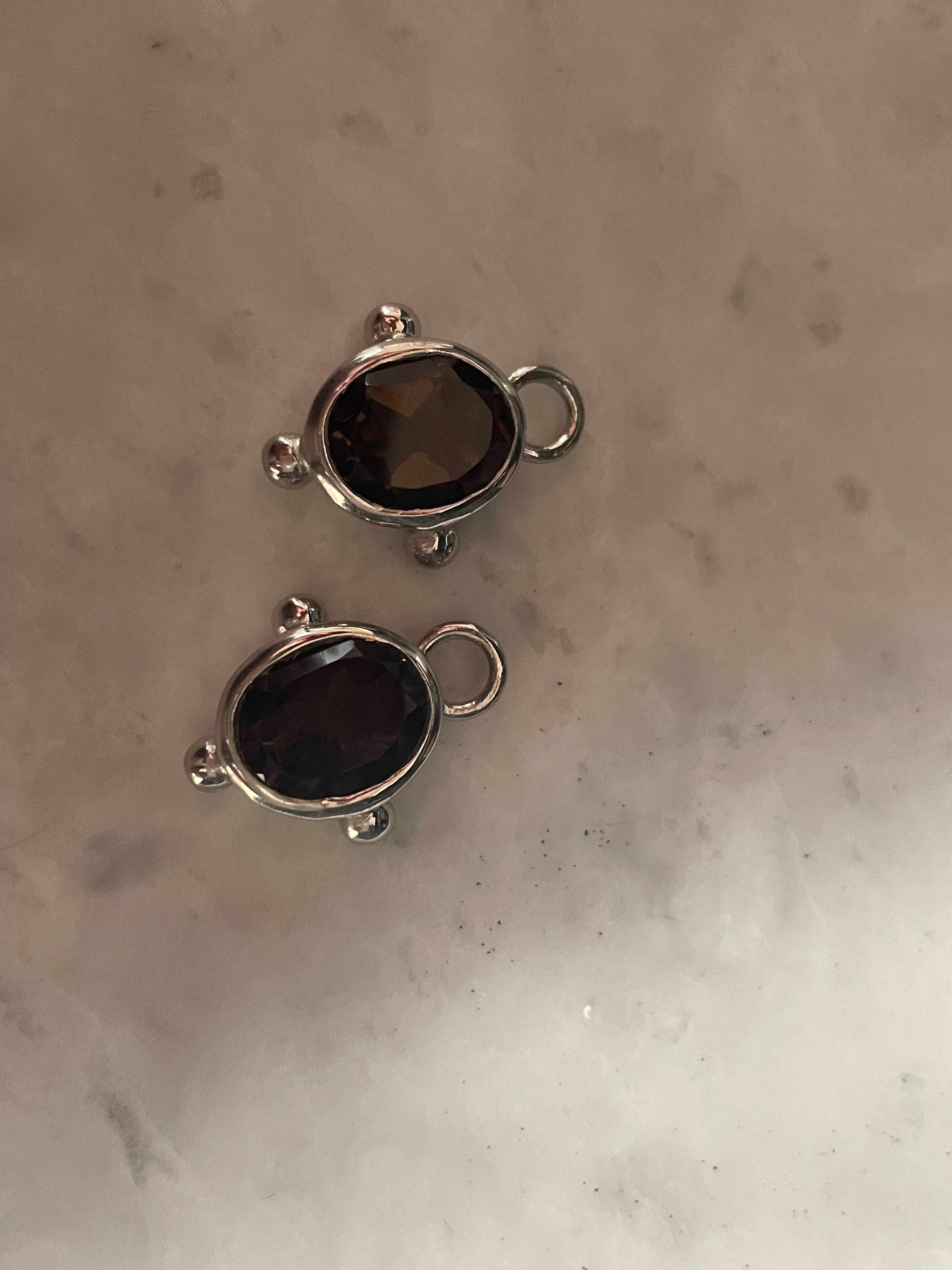The Silver Oval Drops