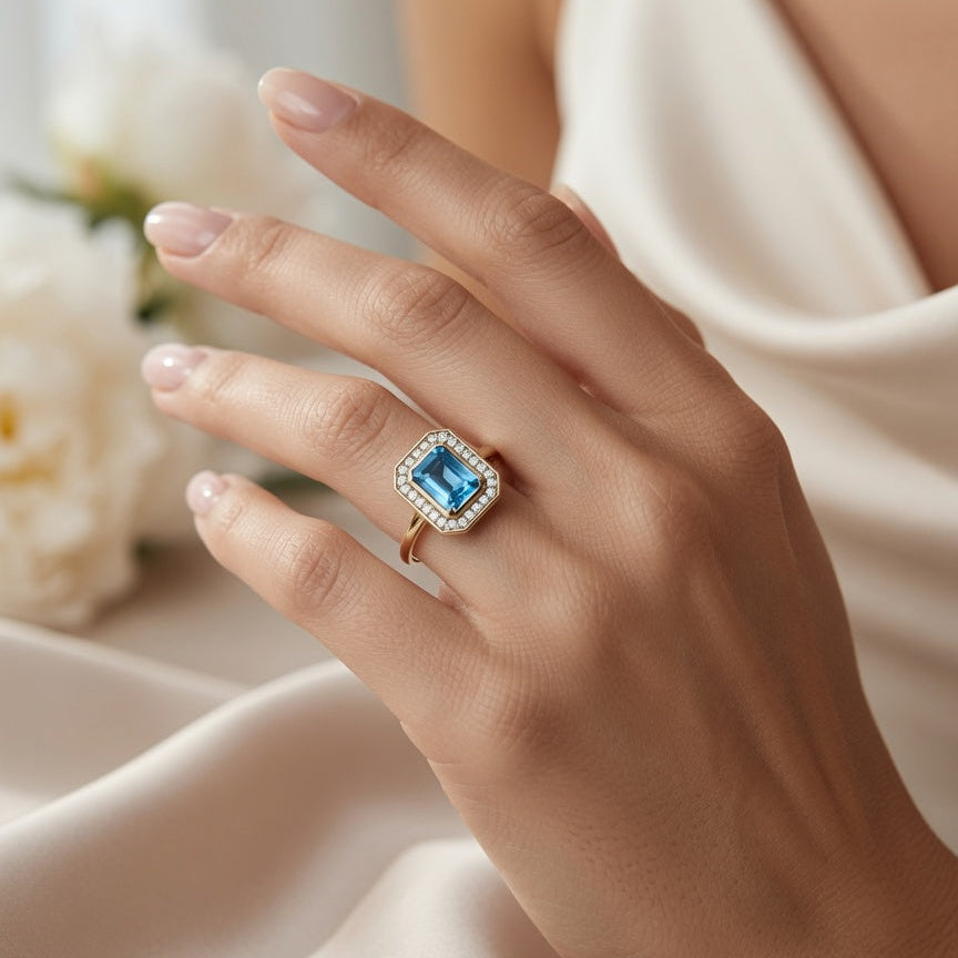 Sample:  The Blue Topaz Halo Ring Size K