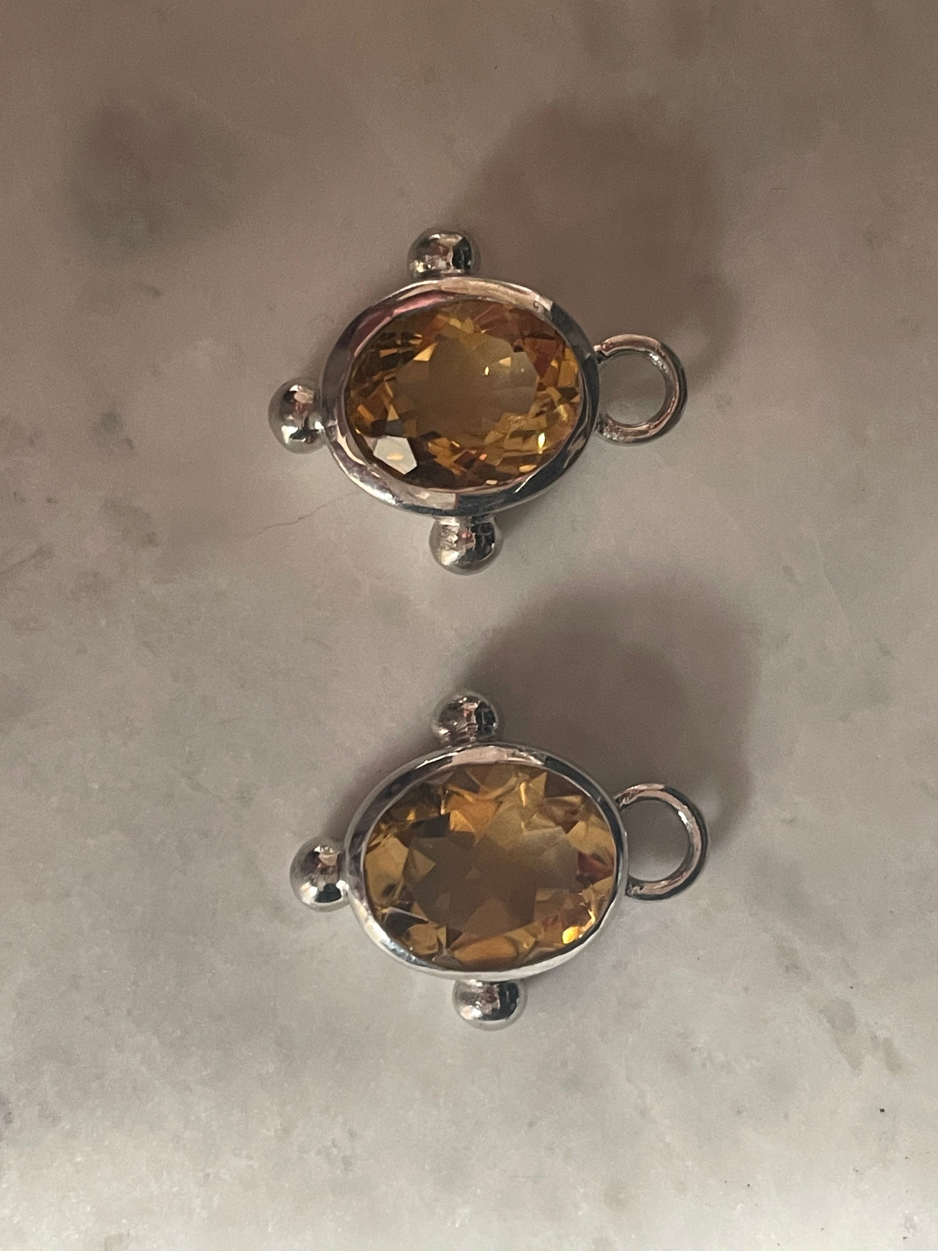 The Silver Oval Drops
